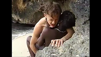 Young black girl enjoys anal sex on the shore