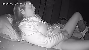 A horny woman wakes up to pleasure herself before work with a hidden camera