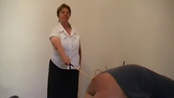 Mature Woman Punishes Man With A Cane In Intense Hardcore Scene